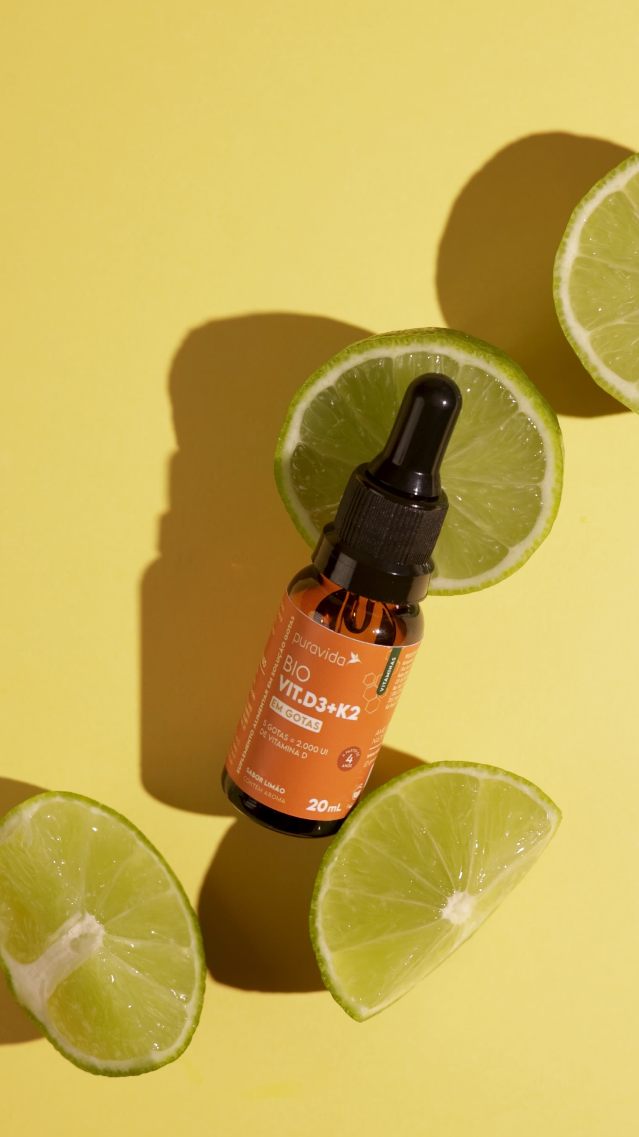 Bio Vit. D3 + K2 em gotas com rodelas de limão Bio Vit. D3 + K2 em gotas com rodelas de limão